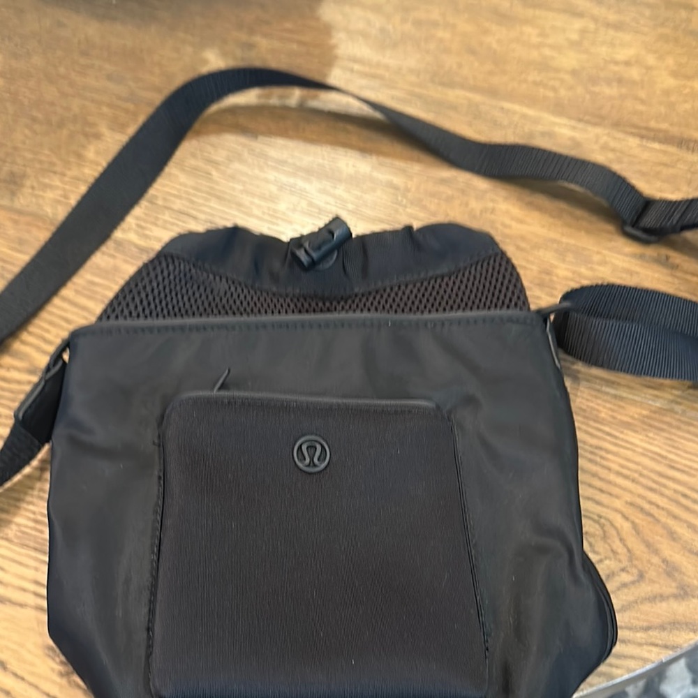lululemon adjustable strap black nylon bucket bag. - Picture 1 of 3